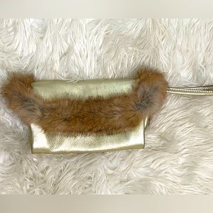 Hype Gold leather clutch with genuine fur trim with wristlet. fully lined